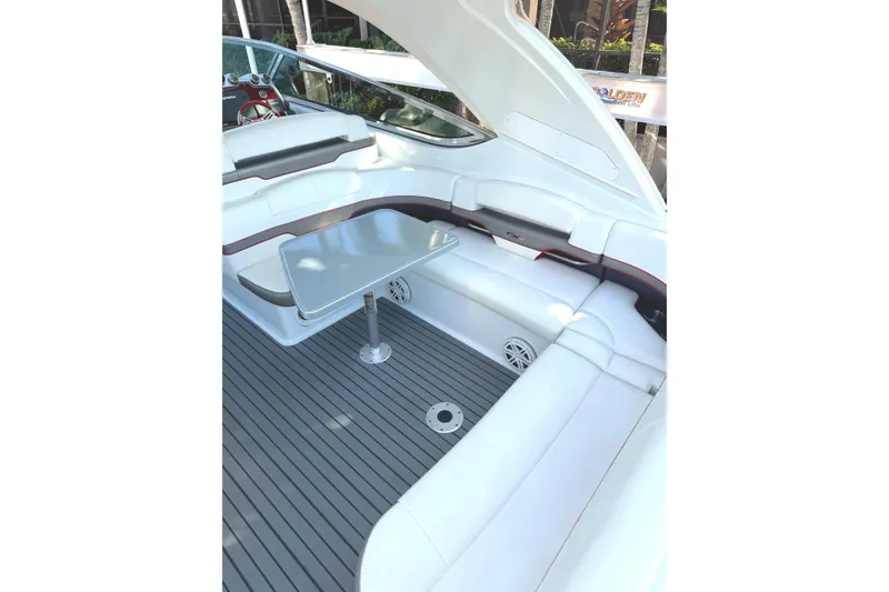 Slide: The Image of 2015 Formula 400 Super Sport boat interior with seating and table. - 9