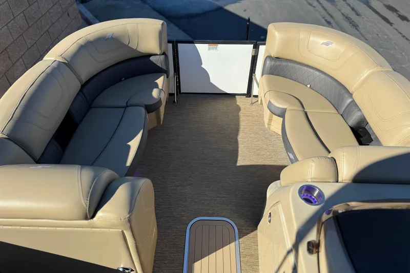 Slide: The Image of Luxurious interior of 2021 Starcraft SLS 3 pontoon boat with beige seating. - 10