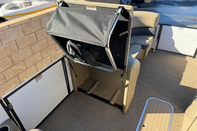 Slide: The Image of 2021 Starcraft SLS 3 boat interior with seating and storage compartment. - 17