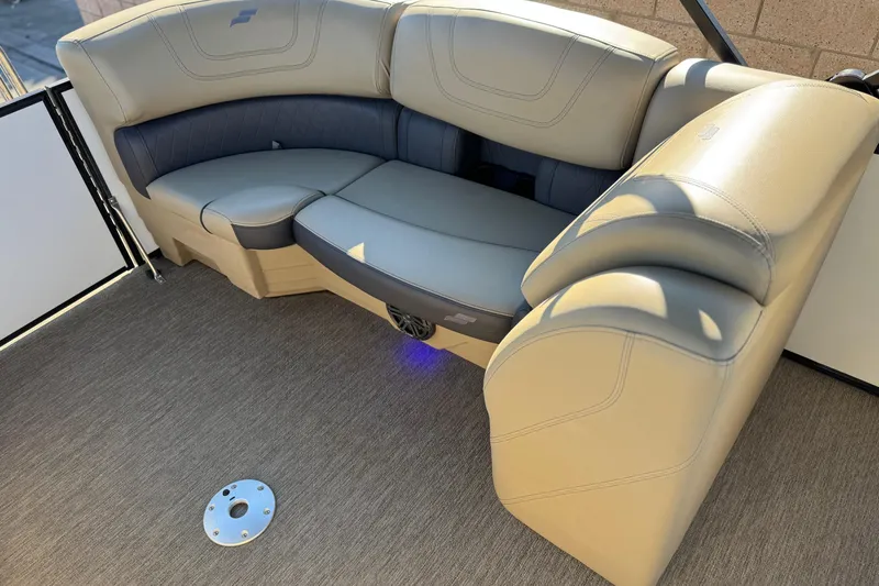 Slide: The Image of Luxurious seating on 2021 Starcraft SLS 3 boat, featuring beige and gray upholstery. - 21