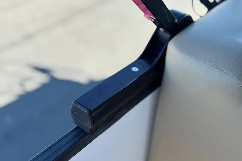 Slide: The Image of Close-up of a 2021 Starcraft SLS 3 boat seat and armrest detail. - 24