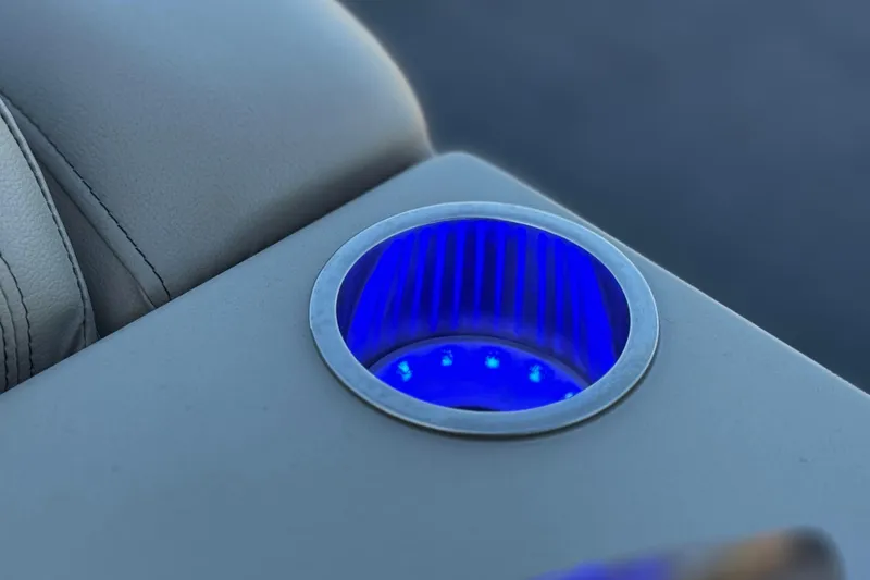 Slide: The Image of Illuminated cup holder in 2021 Starcraft SLS 3 boat interior. - 29
