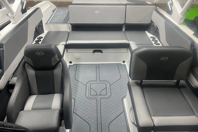Slide: The Image of 2025 Cobalt CS23 Surf boat interior with sleek seating and modern design. - 11