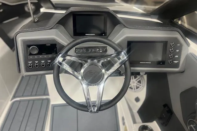 Slide: The Image of 2025 Cobalt CS23 Surf dashboard with modern steering wheel and digital displays. - 18