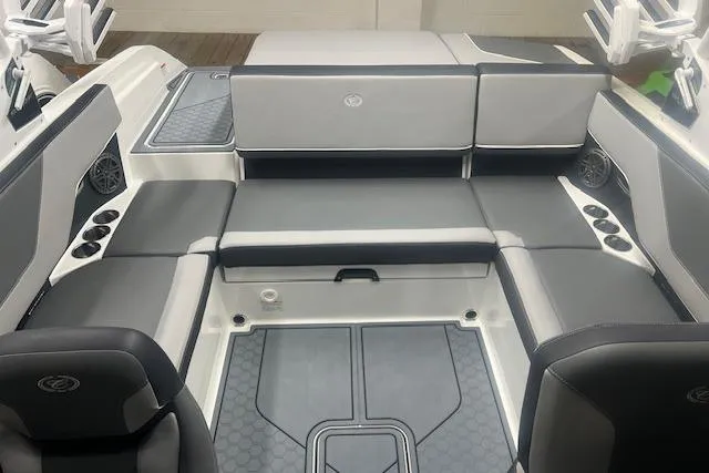 Slide: The Image of 2025 Cobalt CS23 Surf boat interior with sleek seating and modern design. - 19