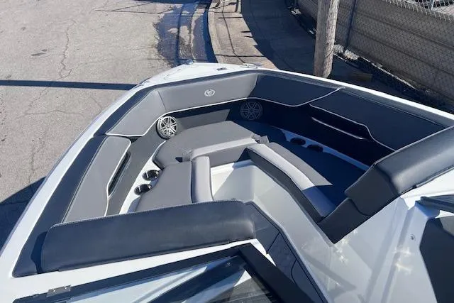 Slide: The Image of 2025 Cobalt CS23 Surf boat interior with sleek seating and modern design. - 7