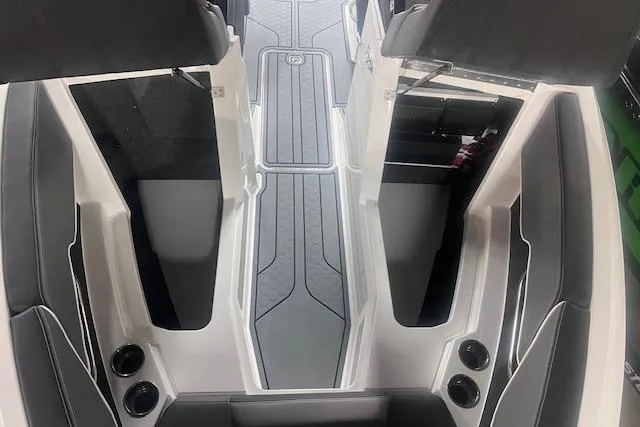 Slide: The Image of Interior view of 2025 Cobalt CS23 Surf boat, featuring sleek seating and modern design. - 8