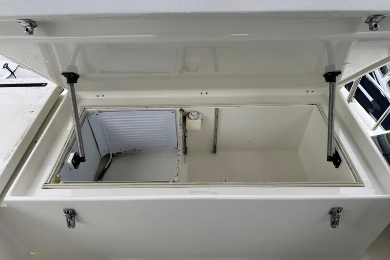 Slide: The Image of Open storage compartment on 1974 Tollycraft 40 Tri-Cabin MY boat. - 33