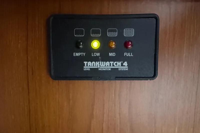 Slide: The Image of TankWatch 4 level monitor system on 1974 Tollycraft 40 Tri-Cabin MY, indicating low level. - 35