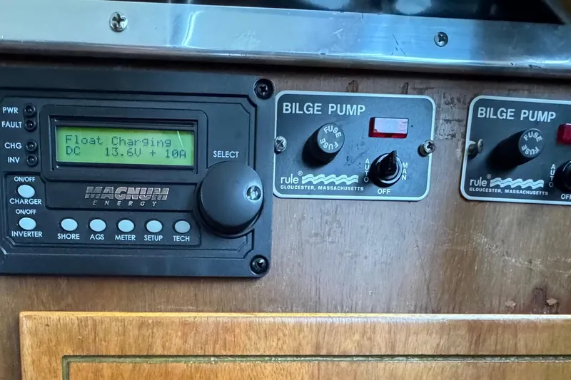 Slide: The Image of Control panel of a 1974 Tollycraft 40 Tri-Cabin MY with bilge pump and charger display. - 37