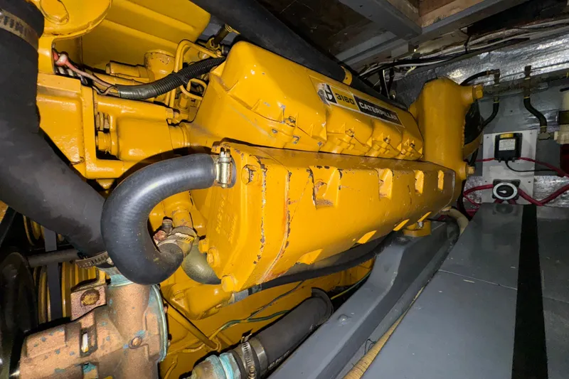 Slide: The Image of 1974 Tollycraft 40 Tri-Cabin MY engine room with Caterpillar 3160 engine. - 44