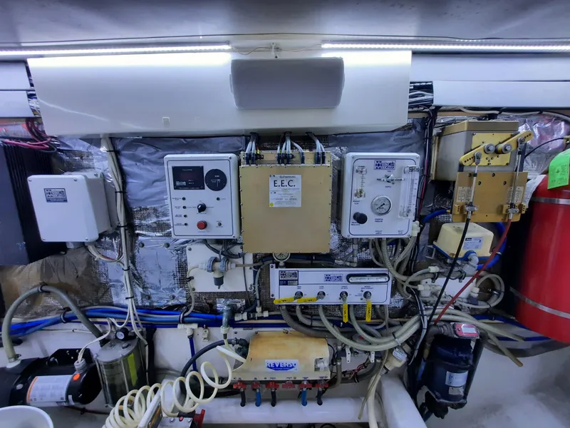 Slide: The Image of Engine room of a 2000 Cabo 45 Express boat. - 44