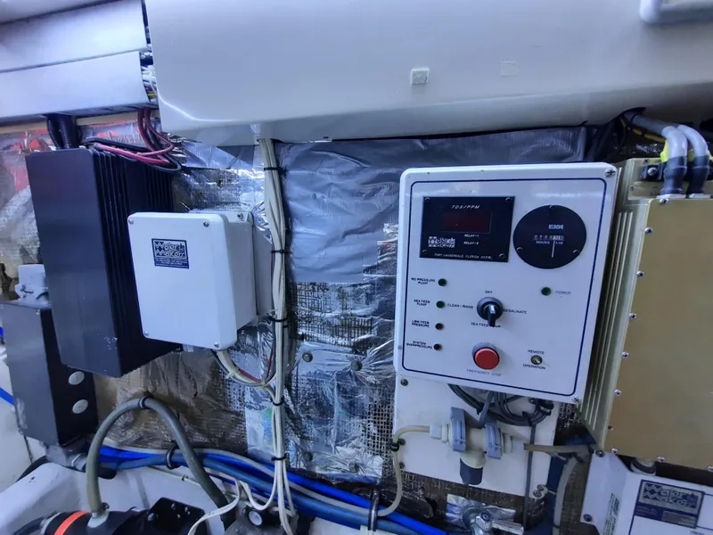 Slide: The Image of Electrical control panel in a 2000 Cabo 45 Express yacht. - 45