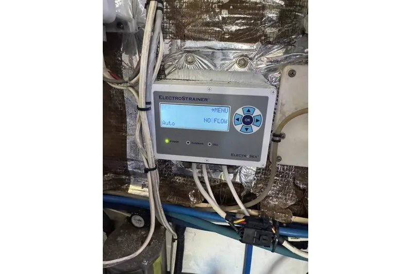 Slide: The Image of Control panel of ElectroStrainer system on 2000 Cabo 45 Express boat. - 69