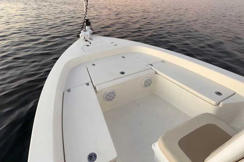 Slide: The Image of 2014 Pathfinder 2200 TRS boat interior on calm water. - 18