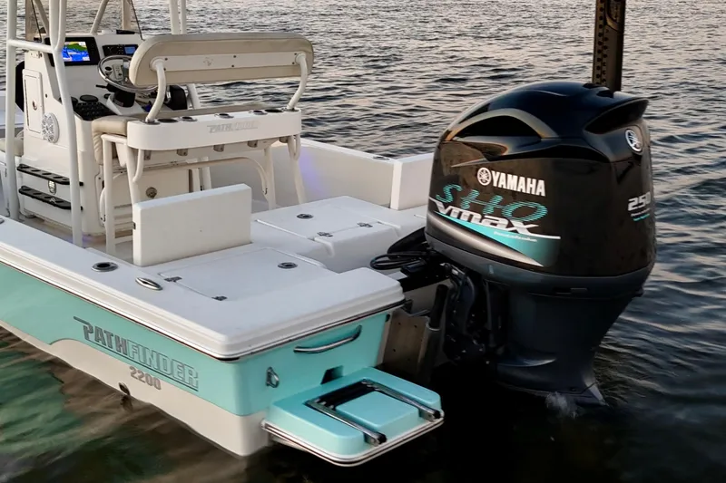 Slide: The Image of 2014 Pathfinder 2200 TRS boat with Yamaha VMAX engine on water. - 25