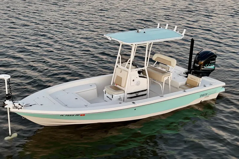 Slide: The Image of 2014 Pathfinder 2200 TRS boat on calm water, featuring a Yamaha outboard motor. - 32