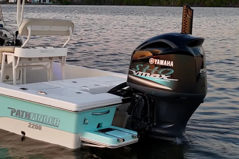 Slide: The Image of 2014 Pathfinder 2200 TRS boat with Yamaha VMAX engine on calm water. - 45