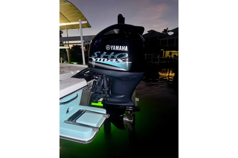 Slide: The Image of Yamaha SHO VMAX outboard motor on 2014 Pathfinder 2200 TRS boat at dusk. - 5