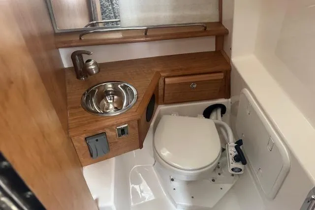 Slide: The Image of 2026 Cutwater C-248 Coupe kitchen sink with modern faucet and sleek countertop design. - 13