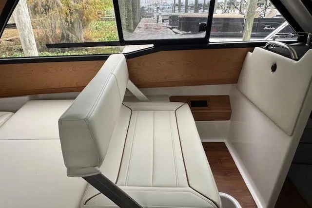 Slide: The Image of 2026 Cutwater C-248 Coupe interior cabin with cozy sleeping area and natural light. - 16