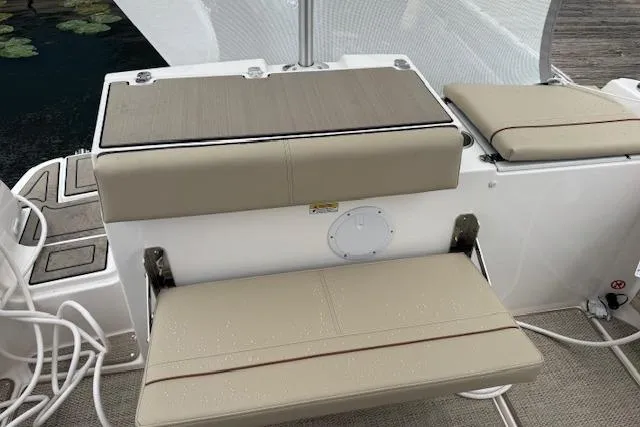 Slide: The Image of Control panel inside 2026 Cutwater C-248 Coupe boat, featuring switches and gauges. - 22