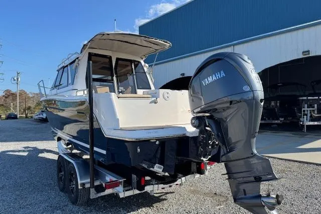 Slide: The Image of 2026 Cutwater C-248 Coupe boat with Yamaha outboard motor on trailer. - 42