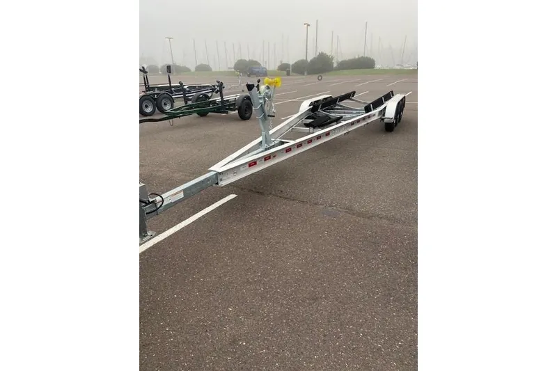 Slide: The Image of Boat trailer in parking lot, compatible with 2004 Regal Commodore 2860. - 14