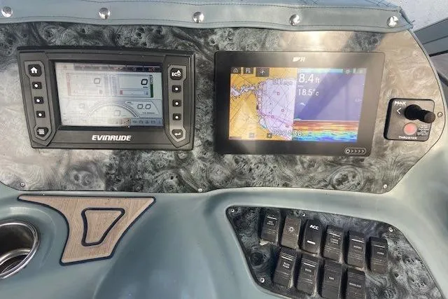 Slide: The Image of Control panel of 2004 Regal Commodore 2860 boat with navigation and engine displays. - 8