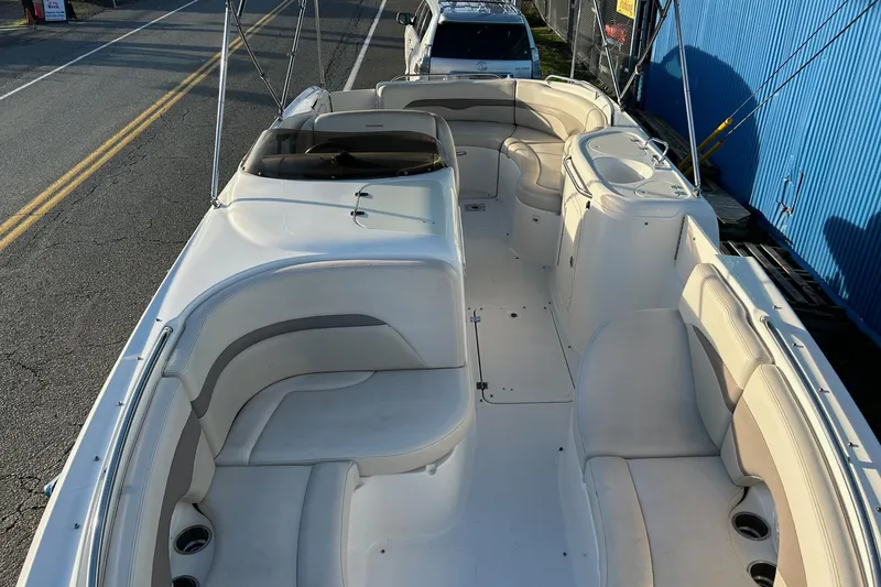 Slide: The Image of 2005 Chaparral Sunesta 252 boat interior with spacious seating and sleek design. - 16