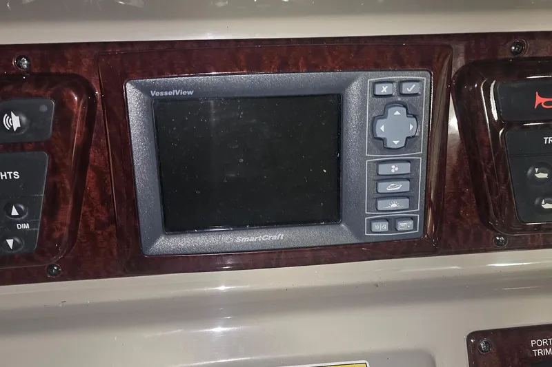 Slide: The Image of Control panel of a 2012 Sea Ray 370 Sundancer with VesselView display. - 13