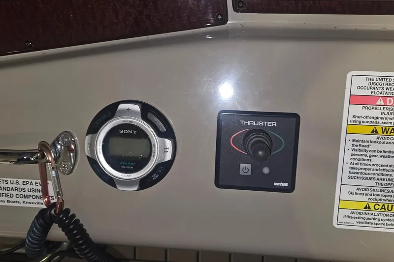 Slide: The Image of Control panel of a 2012 Sea Ray 370 Sundancer with Sony marine audio system. - 14