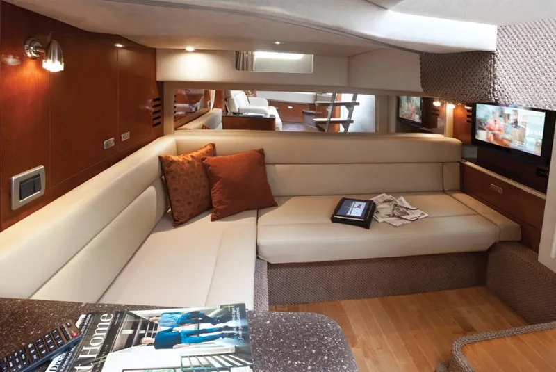 Slide: The Image of Manufacturer Provided Image: Luxurious interior of 2012 Sea Ray 370 Sundancer yacht with cozy seating area. - 24