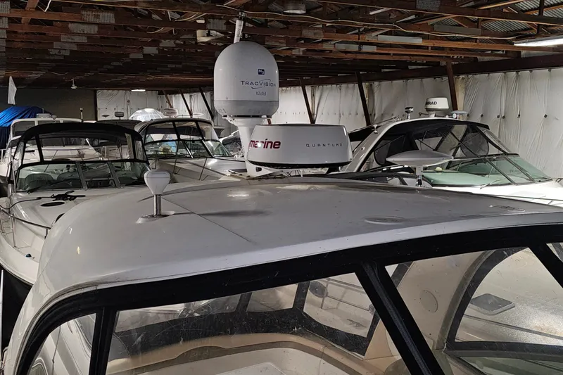 Slide: The Image of Indoor storage of multiple Sea Ray 370 Sundancer boats, 2012 model, with advanced radar equipment. - 33