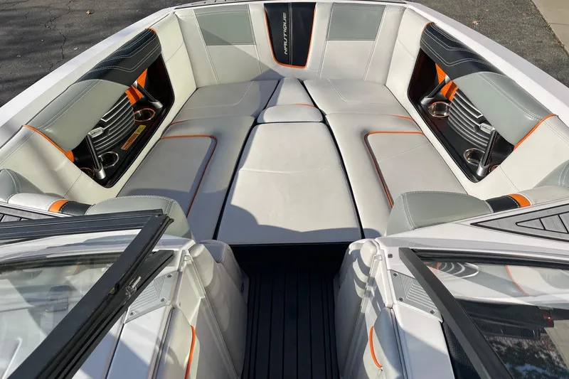 Slide: The Image of 2015 Nautique Super Air Nautique G23 boat interior with sleek seating and modern design. - 11
