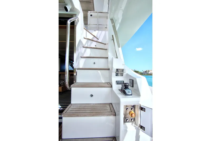 Slide: The Image of Staircase on 2017 Azimut 72 Flybridge yacht with ocean view. - 14