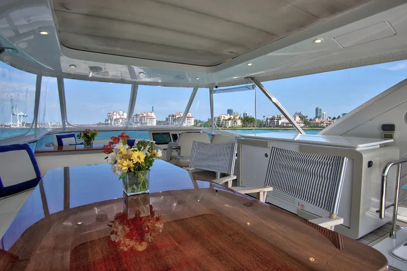 Slide: The Image of Luxurious interior of 2017 Azimut 72 Flybridge yacht with elegant seating and ocean view. - 24