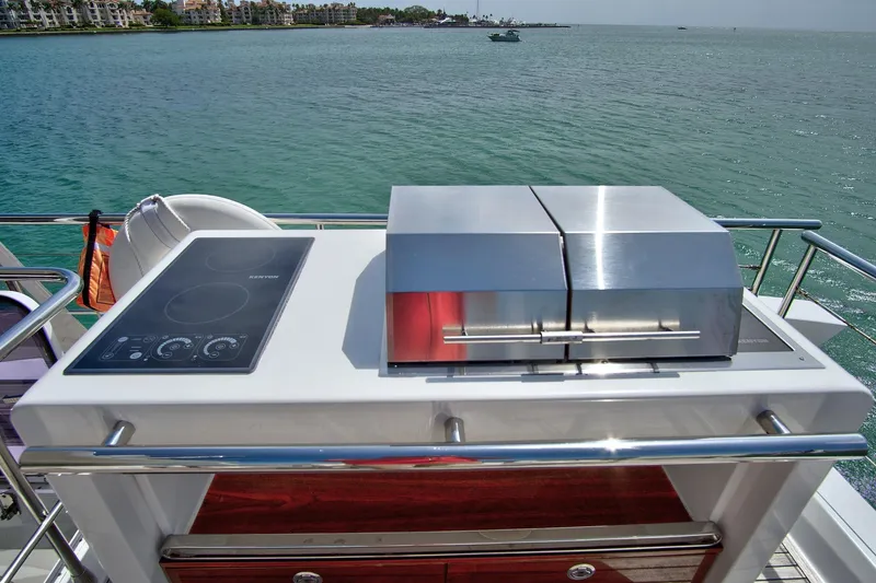 Slide: The Image of Outdoor kitchen on 2017 Azimut 72 Flybridge yacht with ocean view. - 25