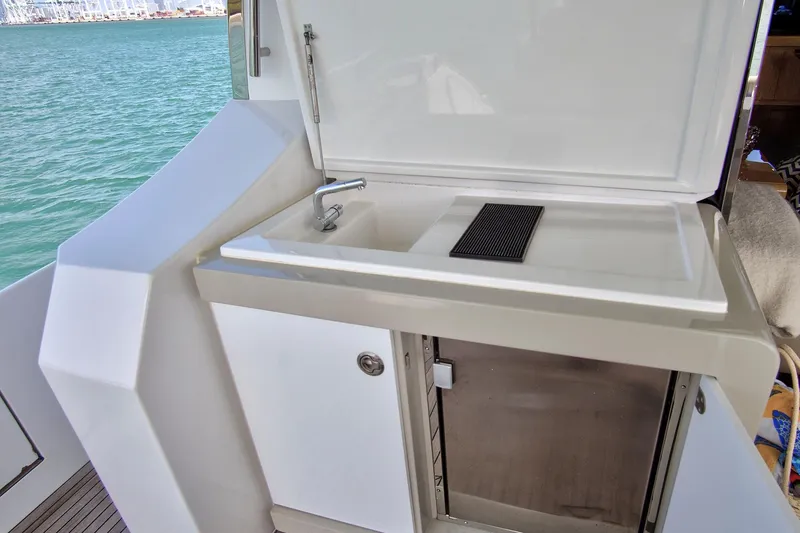 Slide: The Image of Outdoor sink and counter on 2017 Azimut 72 Flybridge yacht, overlooking the ocean. - 27