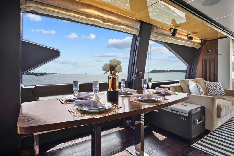 Slide: The Image of Luxurious dining area on 2017 Azimut 72 Flybridge yacht with ocean view. - 33