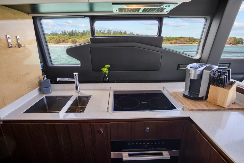 Slide: The Image of Modern kitchen interior on 2017 Azimut 72 Flybridge yacht with ocean view. - 36