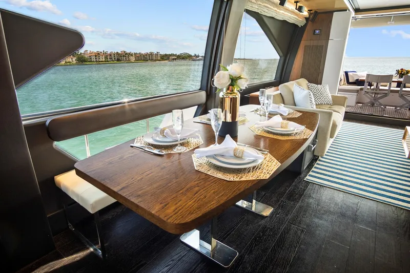 Slide: The Image of Luxurious interior of 2017 Azimut 72 Flybridge yacht with elegant dining setup. - 37