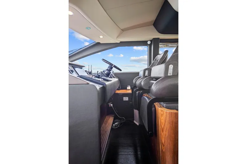 Slide: The Image of Interior view of 2017 Azimut 72 Flybridge yacht cockpit with modern controls and seating. - 39