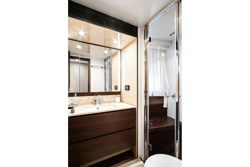 Slide: The Image of Luxurious bathroom interior of 2017 Azimut 72 Flybridge yacht, featuring modern fixtures and elegant design. - 44