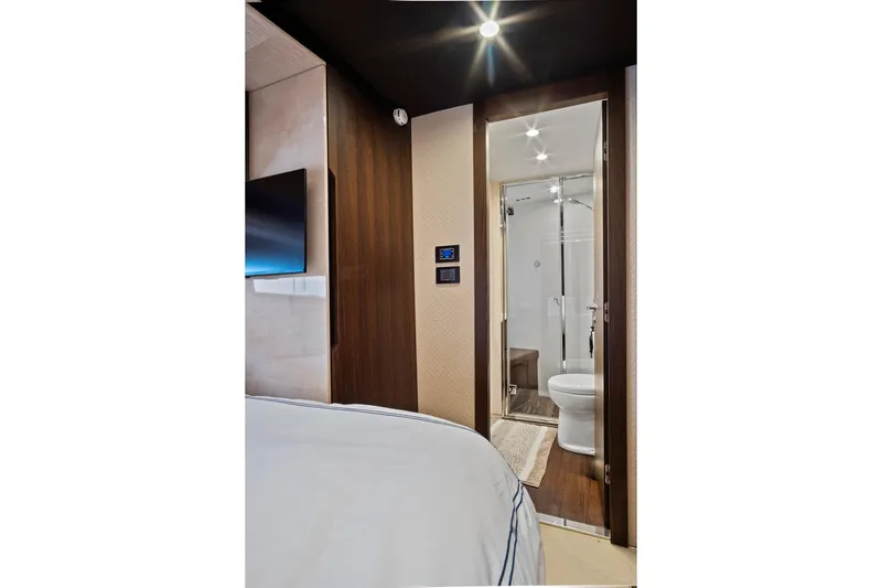 Slide: The Image of Luxurious interior of 2017 Azimut 72 Flybridge yacht featuring modern bathroom and bedroom. - 46