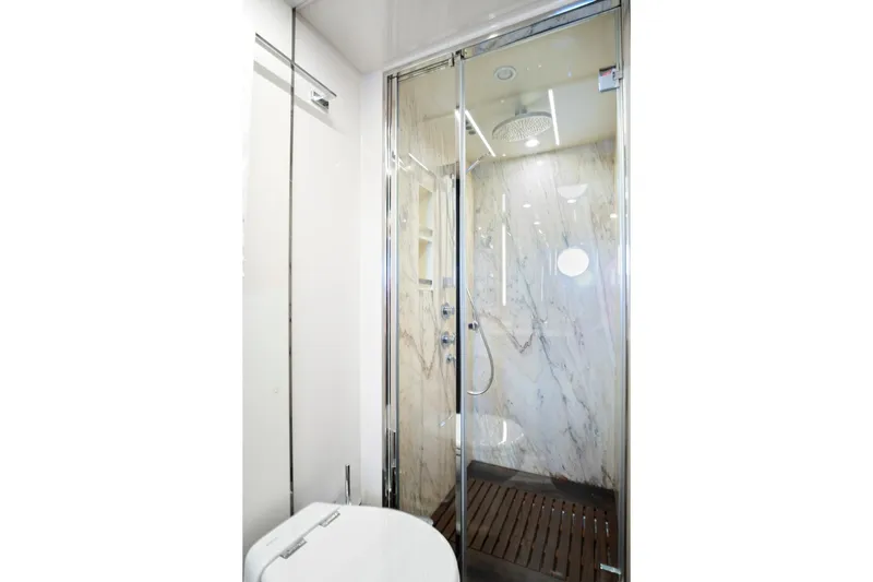 Slide: The Image of Luxurious bathroom in 2017 Azimut 72 Flybridge yacht with marble shower and modern fixtures. - 53