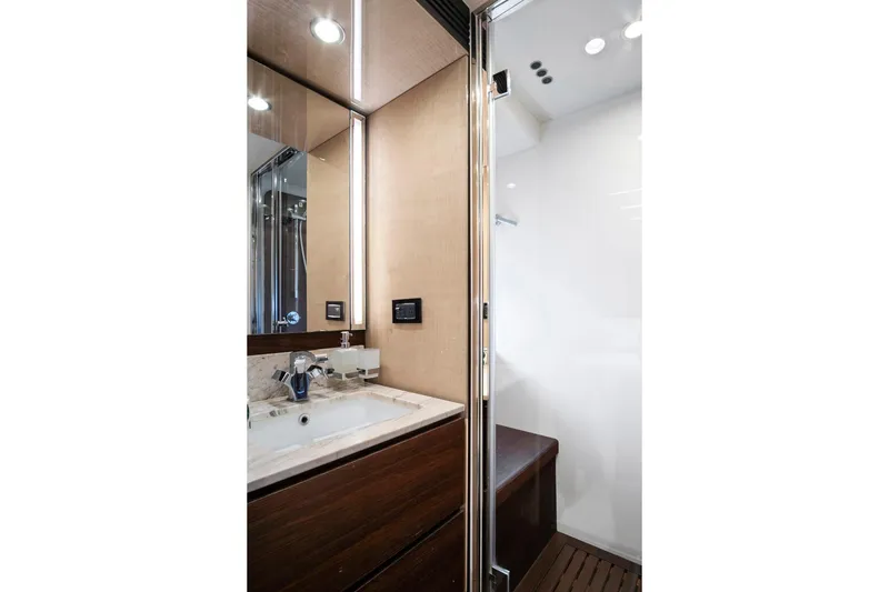 Slide: The Image of Luxurious bathroom interior of 2017 Azimut 72 Flybridge yacht, featuring modern sink and shower. - 55