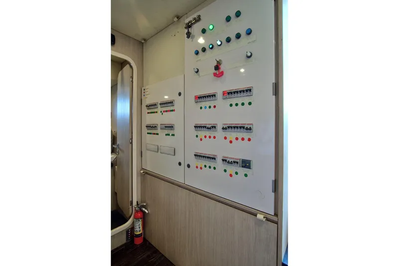 Slide: The Image of Electrical control panel on a 2017 Azimut 72 Flybridge yacht interior. - 58