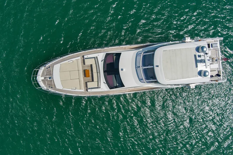 Slide: The Image of Aerial view of 2017 Azimut 72 Flybridge yacht on turquoise water. - 8