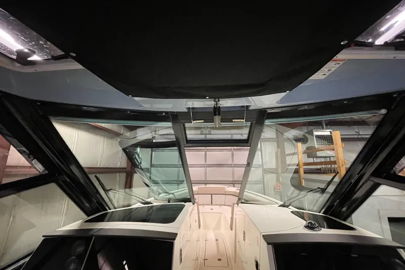 Slide: The Image of 2025 Boston Whaler 330 Vantage interior view with sleek design and modern features. - 12